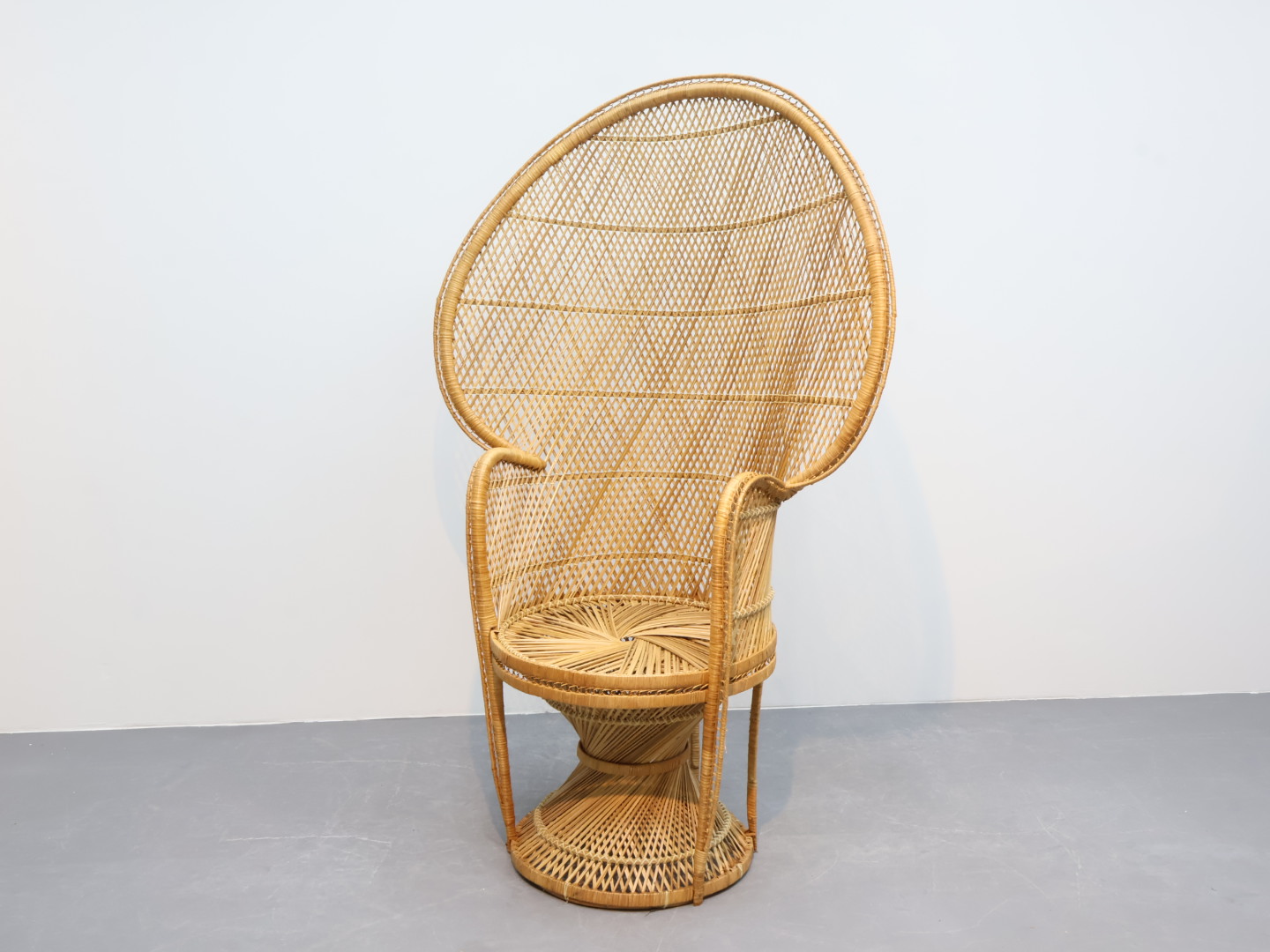 Vintage pauwenfauteuil / Jaren `70 / Riet